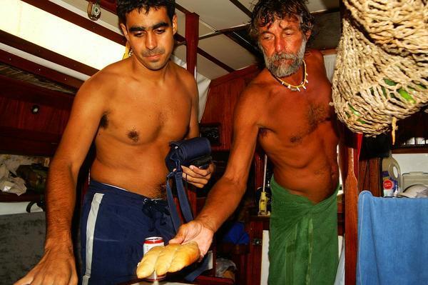 Hernando (the capitan) and me inside the boat, trying to prepare a meal