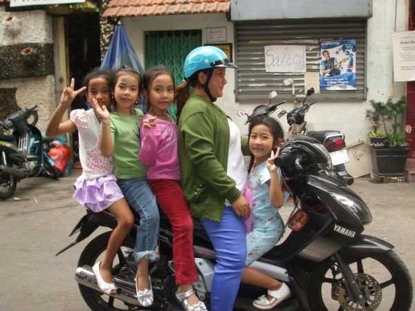 Five people on a motorbike - that's just wrong!!
