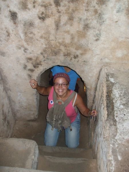 Me climbing through one of the tunnels at Cu Chi