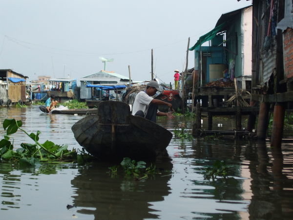 A boy fishing in the Mekong