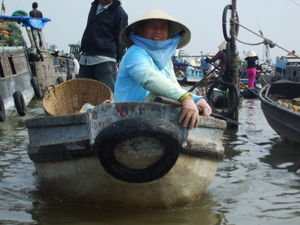 One of the sellers at the floating market