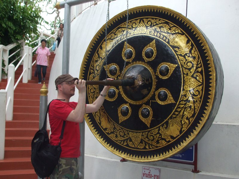 Nat banging a gong at the golden mount