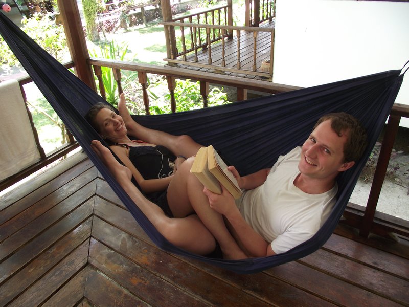 Seb and Amy chilling in their hammock