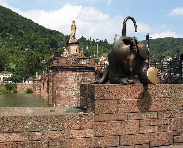 A Bronze Cat Protecting the Entrance to  the Karl-Theodor-Brucke  or The Alte Brucke Over the Neckar River, Heidelberg, Germany   