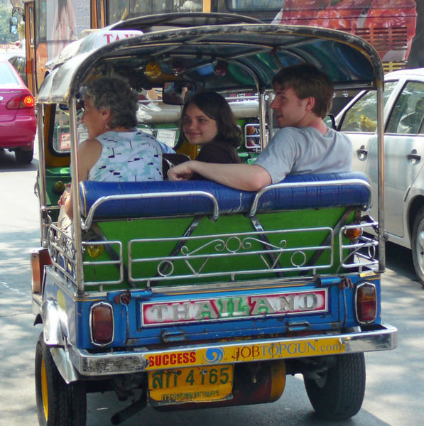 Mom and the kids in a tuktuk