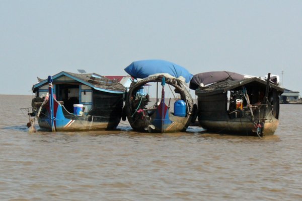 Three boats - starter homes on Tonle Sap Lake