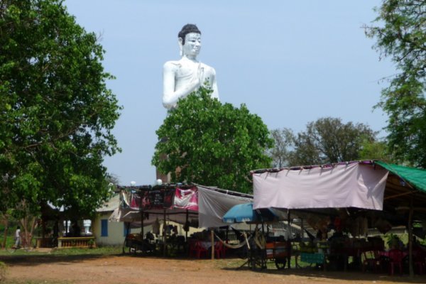 Unfinished Buddha towering over the countryside