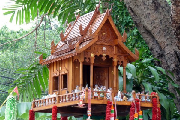 I adore these wooden spirit houses