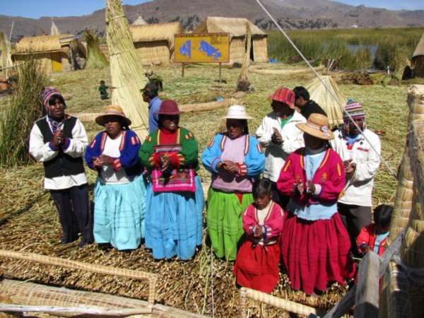 The people of the Uros Islands welcoming us