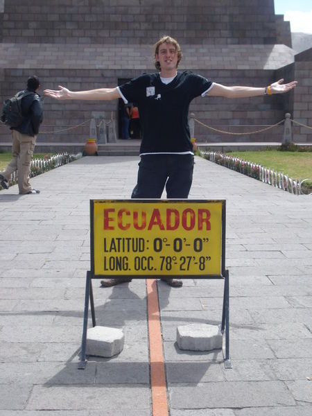 On the equator line at the Mitad del Mundo