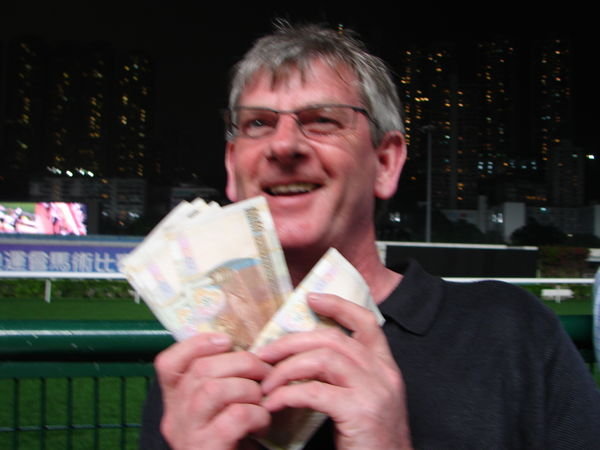 Dad with his winnings at the races!