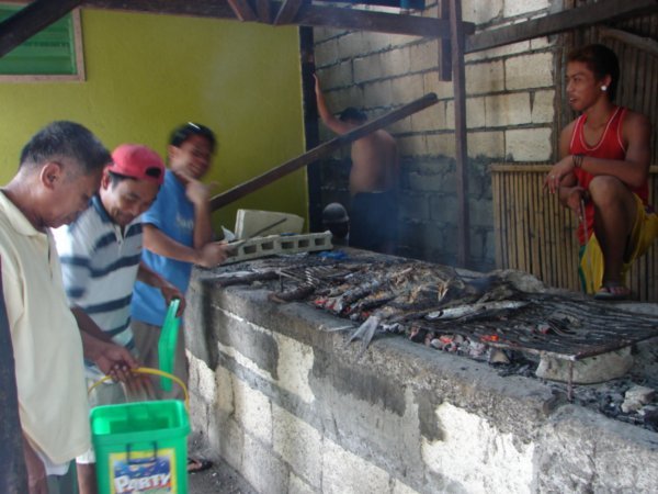 BBQing fish at Dumaluan