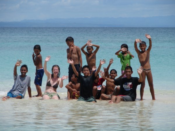 Enjoying the amazing beach on Batman Island with some of the local kids