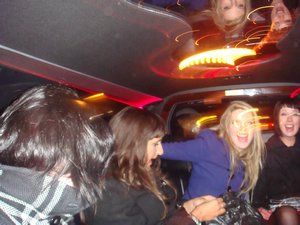 Looking a wee bit excited to be in a limo
