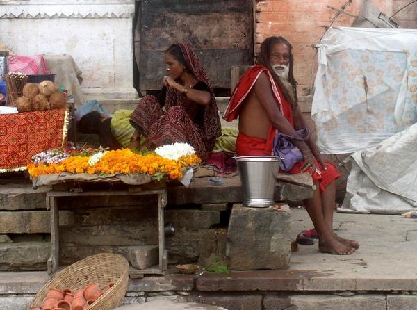 Local lady sells flowers and other stuff hindus used as offerings, Varanasi