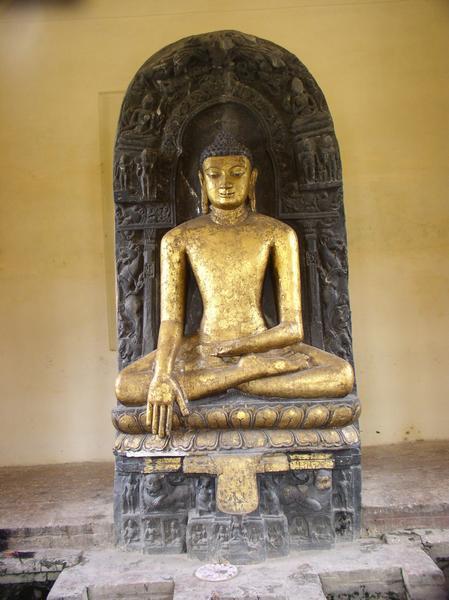 Black Buddha with gold sheets at the Matha-Kuar Shrine, Kushinagar