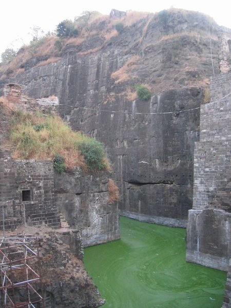 A moat of green sludge