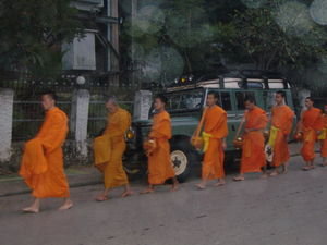 Giving alms to monks