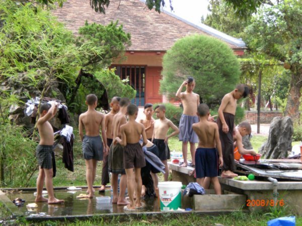 Hue - little monk boys bathing