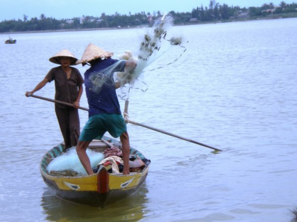 and he throws the fishing net