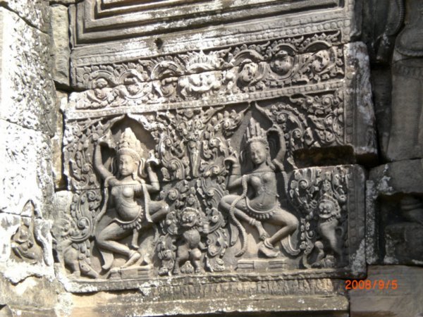 intricate carvings of Apsaras- the celestial female dancers brought to life during the Churning of the Ocean of Milk