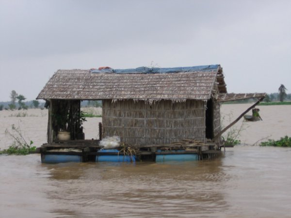 A local house floating on the river