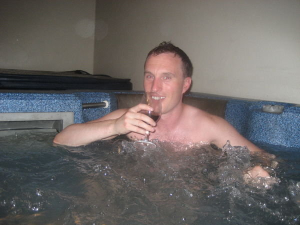 Enjoying a drink in the hot tub