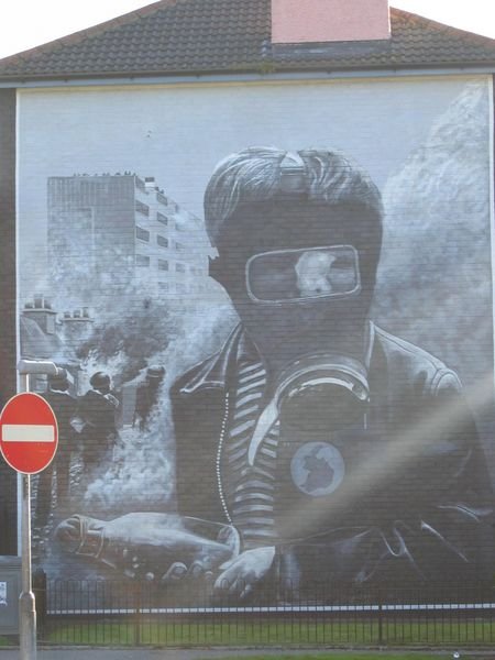 Ominous conflict murals in northern Ireland...Derry