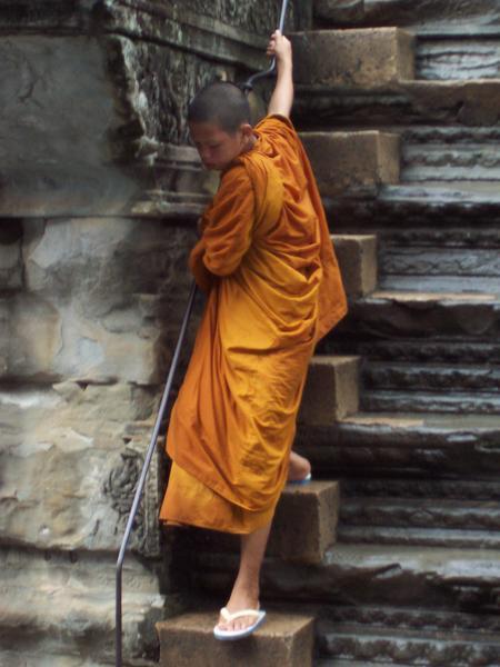 Monk descending the steps from heaven