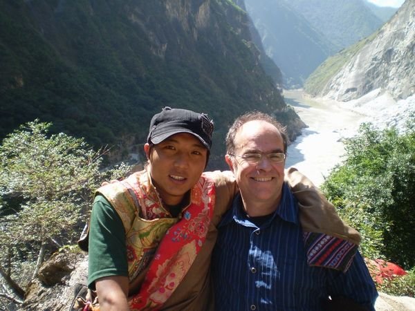 Cliff with Tibetan Tour Guide