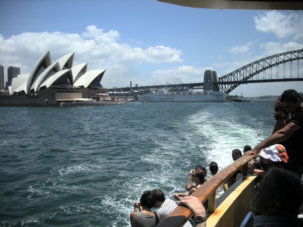 On the ferry to Manly with the Opera House and Harbour Bridge in the background