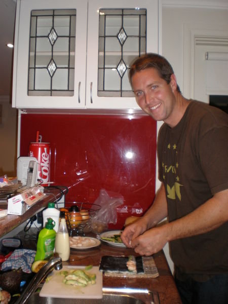 Brett making sushi for the roomies at Percy St.