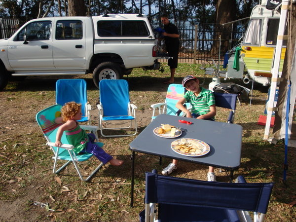 Maddy and Hayden having Happy Hour at our campsite in Jervis Bay.