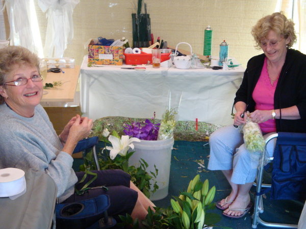 Merry and Shelly prepping the flowers for Megan's wedding
