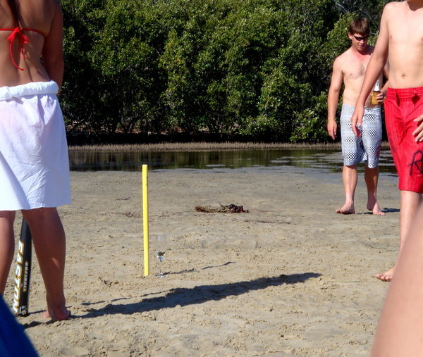 The Aussies love their beach cricket and their champers! (Note the champagne glass next to the wicket.)