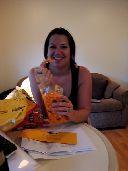 Me and part of my birthday package from my parents in Canada - Cheezies!