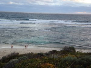Surfers Point in Margaret River and Simon's kids taking a dip, too cold for us!