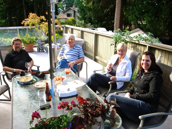 Brett's Dad, Kara's Dad and Mom, and Kara at a BBQ at Brett's parents in Tsawwassen the day we landed back in Vancouver.