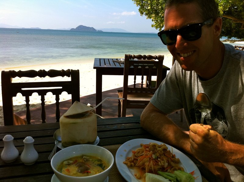 Brett enjoying another Papaya Salad and Green Curry