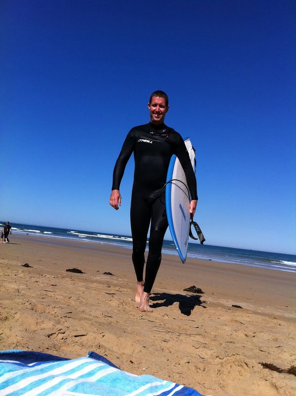 ...and Brett surfing (and happy to be back in the water!)