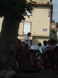 The junior orchestra at Laroque play in the square
