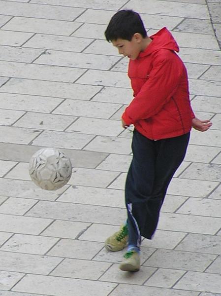 Kid playing football