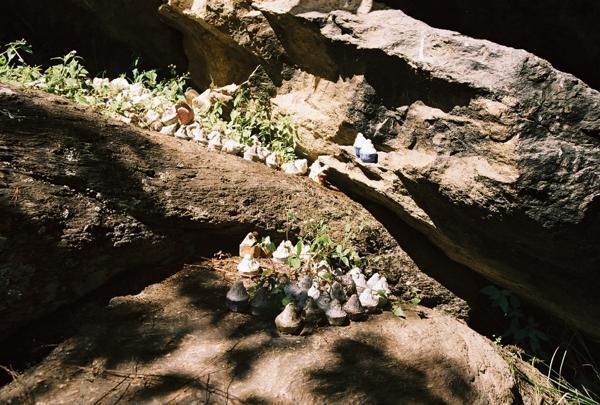Miniature stupas left to honour the dead