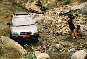Washing the car near Rolong village