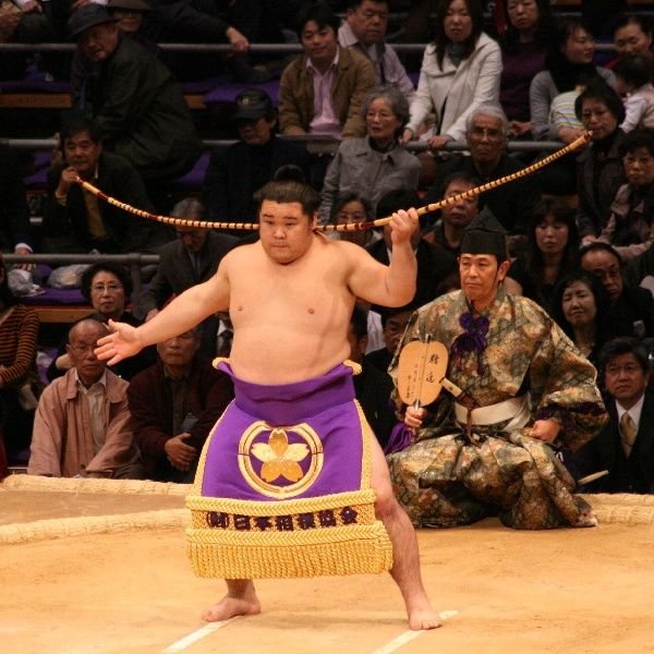The yumitori-shiki or bow ceremony ends the day's bouts