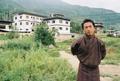 Tshering outside his new house