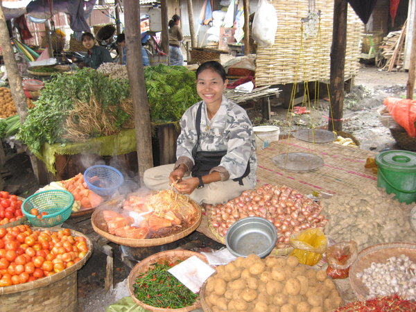 Another market, another smiling vendour