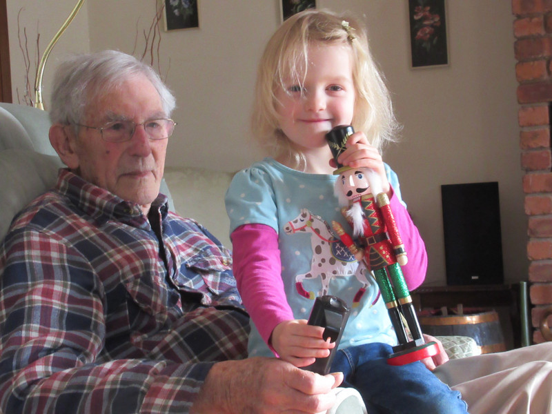 The Nutcracker doll rides on Great Grandads chair