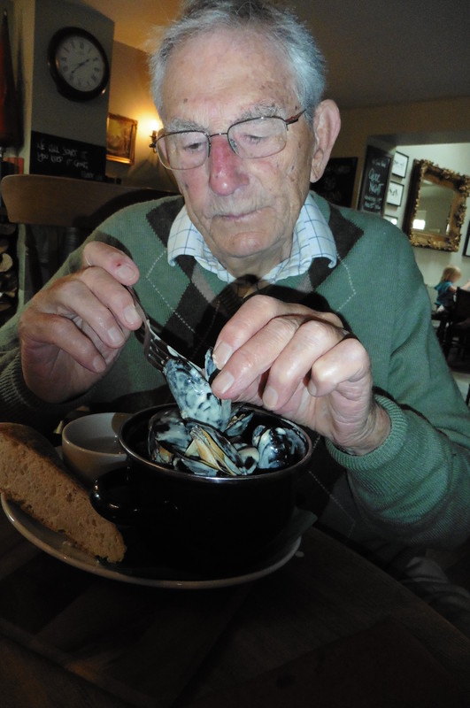 Dad tucked into some mussels