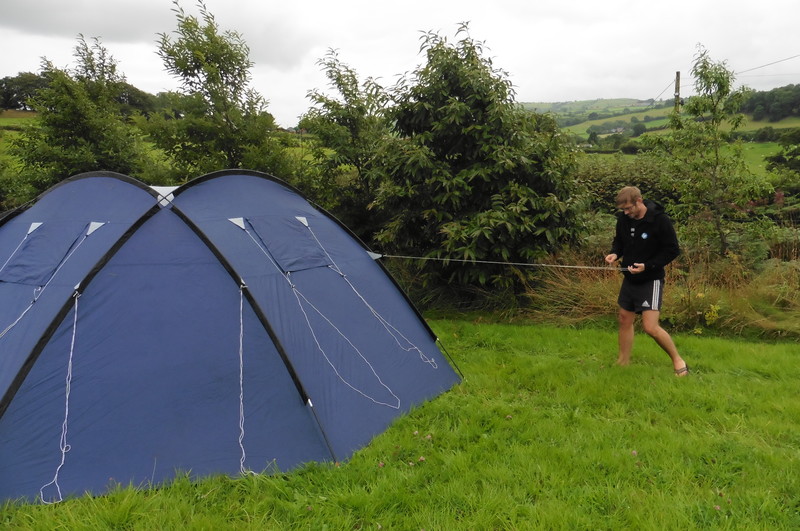 Tom puts the tent up......alone?